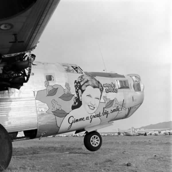B-24 Liberator "Mabel's Labels" ... "Gimme a Great Big Smile!" engines removed and awaiting the smelter B-24 Liberator "Mabel's Labels" ... "Gimme a Great Big Smile!" engines removed and awaiting the smelter at Kingman Army Air Field in Arizona